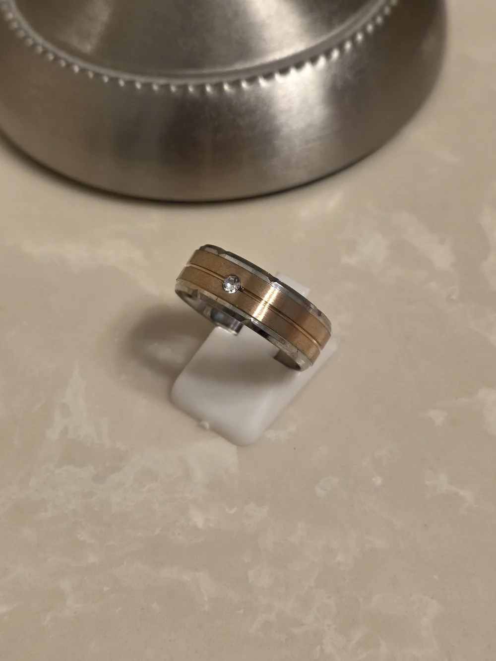 Two-Tone Stainless Steel and Copper-Tone Men’s Band with Center Stone